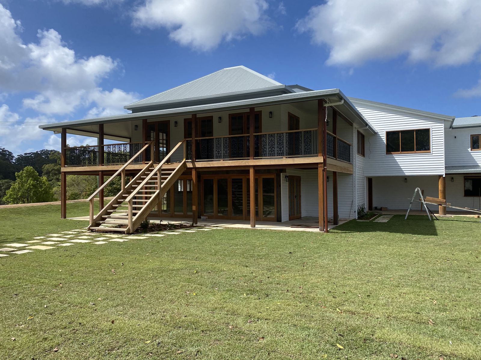 A Sanctum Carpentry custom homestead build with hardwood entry stairs